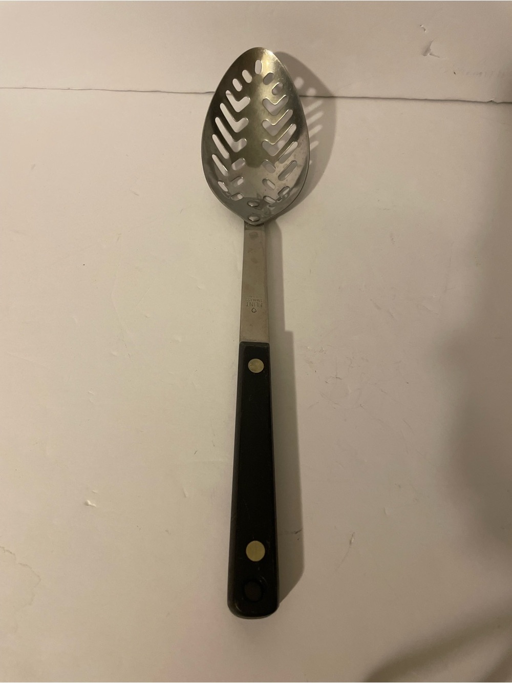 Ekco Flint Black Handle Stainless Steel Slotted Serving Spoon vintage